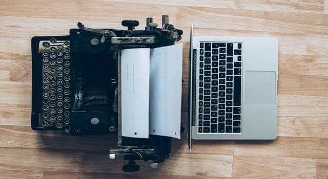 old vs new, typewriter and laptop